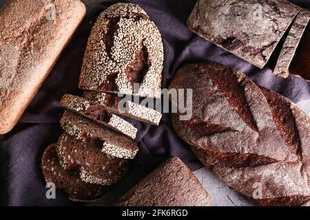 Fresh different bread on table Stock Photo