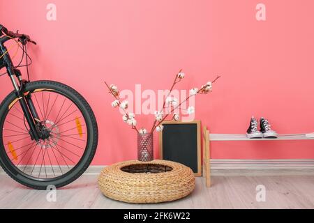 Modern bicycle in interior of hallway Stock Photo