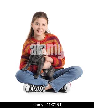 Cute girl with puppy on white background Stock Photo