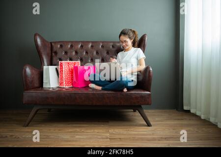 Portrait of young happy smiling woman with shopping bags ,Young happy summer shopping woman Stock Photo