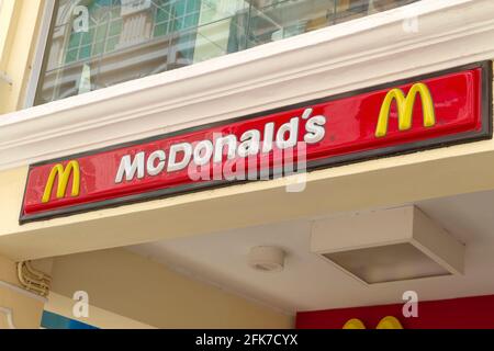 Macau China - Aug 13, 2012. McDonald's restaurant sign. McDonald's is the world's largest chain of hamburger fast food restaurants. Stock Photo