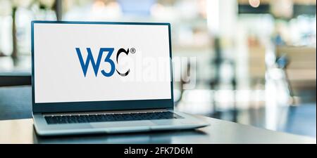 POZNAN, POL - APR 15, 2021: Laptop computer displaying logo of The World Wide Web Consortium (W3C), the main international standards organization for Stock Photo