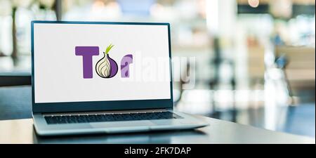 POZNAN, POL - APR 15, 2021: Laptop computer displaying logo of Tor, software for enabling anonymous communication Stock Photo