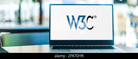 POZNAN, POL - APR 15, 2021: Laptop computer displaying logo of The World Wide Web Consortium (W3C), the main international standards organization for Stock Photo