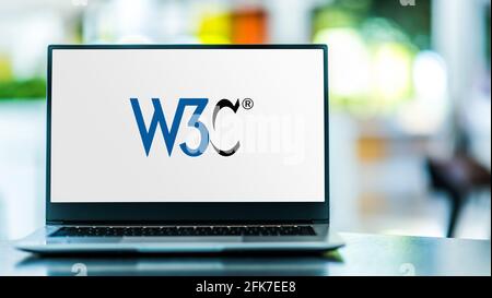 POZNAN, POL - APR 15, 2021: Laptop computer displaying logo of The World Wide Web Consortium (W3C), the main international standards organization for Stock Photo