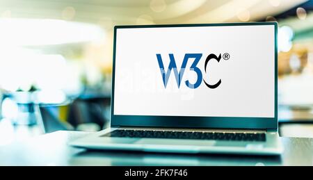 POZNAN, POL - APR 15, 2021: Laptop computer displaying logo of The World Wide Web Consortium (W3C), the main international standards organization for Stock Photo