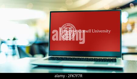 POZNAN, POL - APR 20, 2021: Laptop computer displaying logo of Cornell University, a private, statutory, Ivy League and land-grant research university Stock Photo