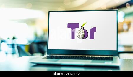 POZNAN, POL - APR 15, 2021: Laptop computer displaying logo of Tor, software for enabling anonymous communication Stock Photo