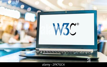 POZNAN, POL - APR 15, 2021: Laptop computer displaying logo of The World Wide Web Consortium (W3C), the main international standards organization for Stock Photo