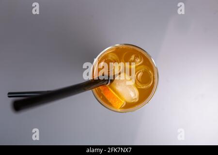 top view orange cocktail with a slice of orange in a glass glass. Stock Photo