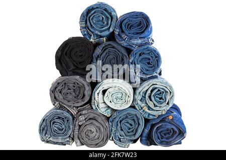 Closeup rolled of blue jeans pants, dark blue denim trousers showing texture isolated on white Stock Photo