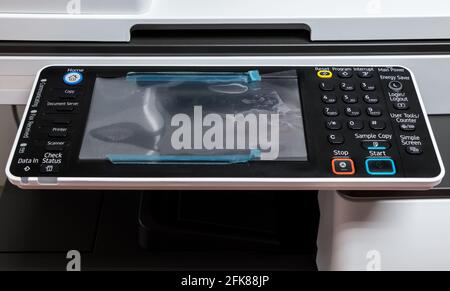Close-up of the touch screen and the number pad on the control panel of the new multifunction photocopier in the small office, front view for the copy Stock Photo