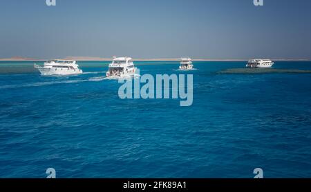 A luxurious yacht in the Red Sea against the blue sky of the unique Ras Mohammed. Stock Photo