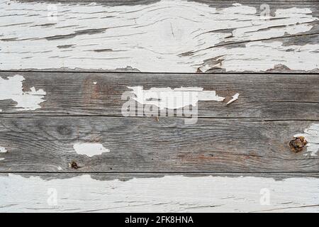 Wooden wall planks with white peeling paint Stock Photo