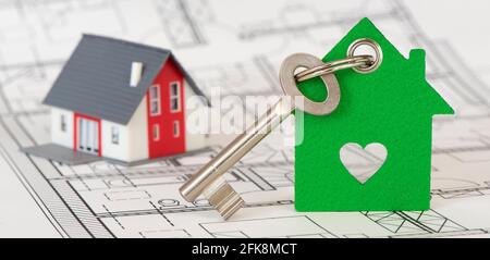 house key laying in construction plan Stock Photo