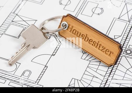 house key laying in construction plan Stock Photo