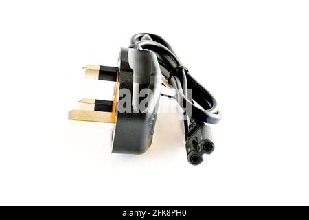 Black electric cable with three-way plug isolated on white background. Stock Photo