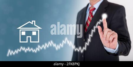 businessman shows success at market with chart Stock Photo