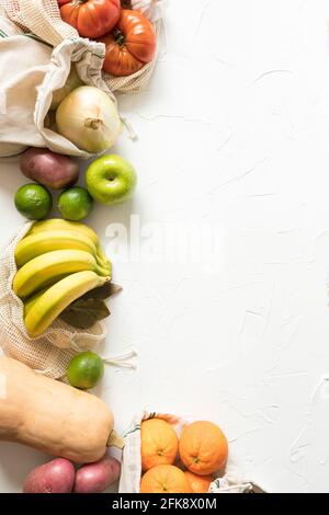 Column of raw healthy colorful vegetables and fruit with a great right empty space. Stock Photo