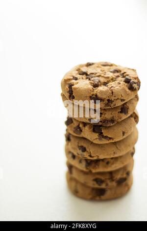 Stack of chocolate chip cookies on white background, isolated, dessert Stock Photo