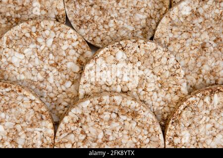 background of puffed rice cakes, flat lay, top view, crunchy rice 