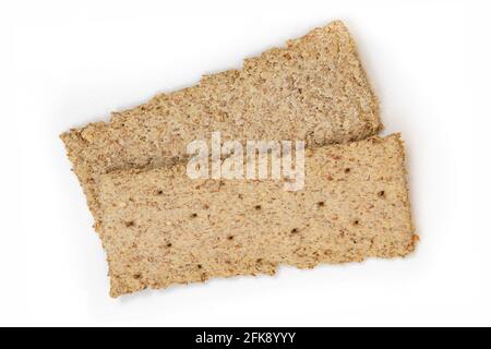 two light brown multigrain rye crispbreads isolated on white background, bread cracker snacks, top view Stock Photo