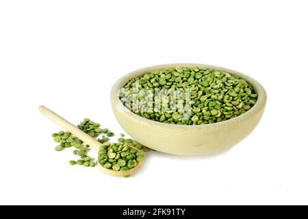 Split peas in wooden bowl isolated on white background Stock Photo