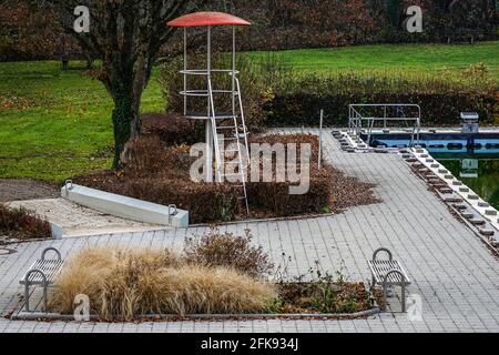 Lifeguard observation tower in an outdoor swimming pool. Stock Photo