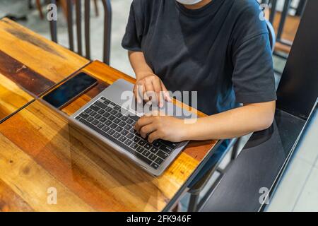 High angle view of female working or studying on laptop Stock Photo