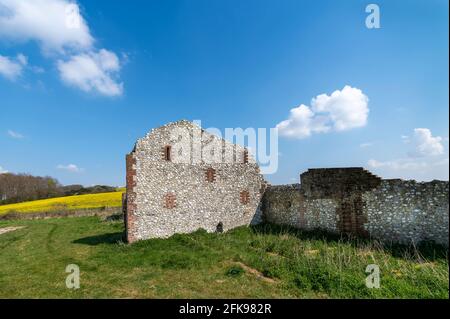 Old ruin of a flint and brick barn in the Sussex Countryside. Stock Photo