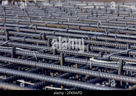 Construction rebar steel work reinforcement. Reinforcements steel bars stack. Close up steel construction rebar. Brand new armature. Stock Photo