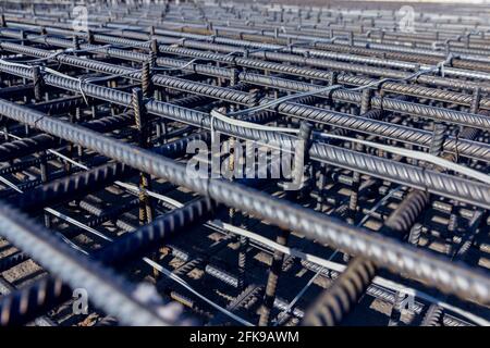 Construction rebar steel work reinforcement. Reinforcements steel bars stack. Close up steel construction rebar. Brand new armature. Stock Photo