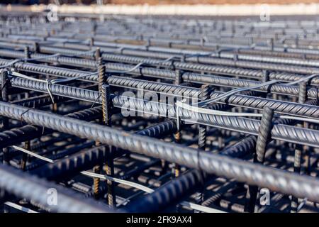 Construction rebar steel work reinforcement. Reinforcements steel bars stack. Close up steel construction rebar. Brand new armature. Stock Photo