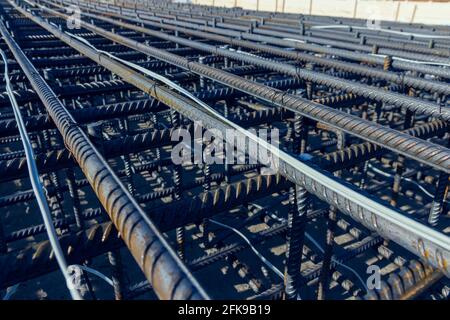 Construction rebar steel work reinforcement. Reinforcements steel bars stack. Close up steel construction rebar. Brand new armature. Stock Photo