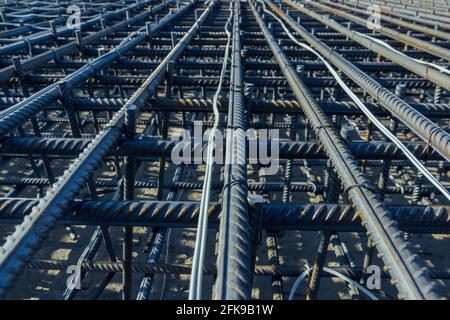 Construction rebar steel work reinforcement. Reinforcements steel bars stack. Close up steel construction rebar. Brand new armature. Stock Photo