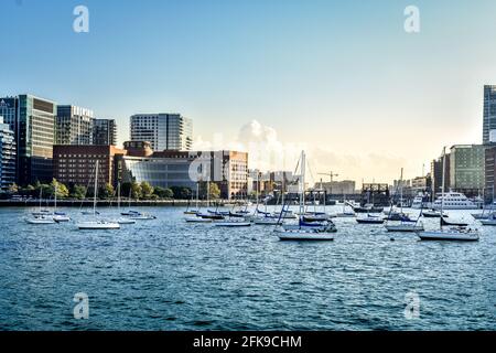 Moored Boats in Boston Harbor with John Joseph Moakley United States Courthouse in View, Boston, Ma Stock Photo