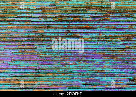 Old shabby textured wood background with cracked colored paint. Backdrop Stock Photo