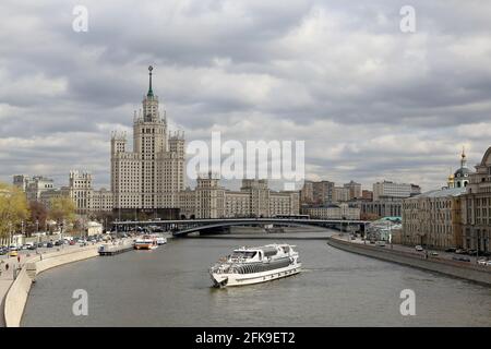 View of the Moscow river and tourist boat on cloudy sky background. Scenic city panorama, russian tourist landmarks Stock Photo