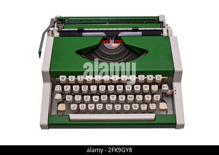 vintage green typewriter isolated on white background Stock Photo