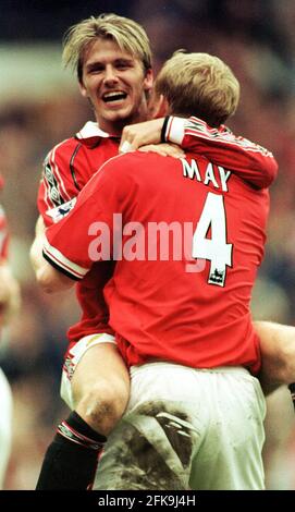 David Beckham,Manchester United celebrates with Eric Cantona after