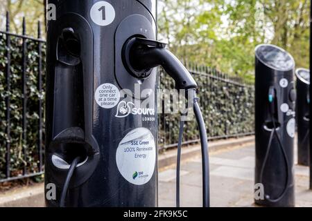 London, UK. 29th Apr, 2021. Electric car charges at the charging station on the street in central London on April 20, 2021. New report by the International Energy Agency suggests that there should be about 145 million electric cars by the end of decade, an increase from today's 11 million. (Photo by Dominika Zarzycka/Sipa USA) Credit: Sipa USA/Alamy Live News Stock Photo