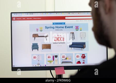 New York, USA - 26 April 2021: Target website page on screen, man using service, Illustrative Editorial Stock Photo