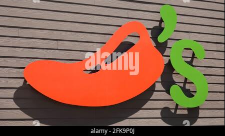 Vista, CA USA - April 29, 2021: Close up of colorful Chili''s sign on a restaurant wall Stock Photo
