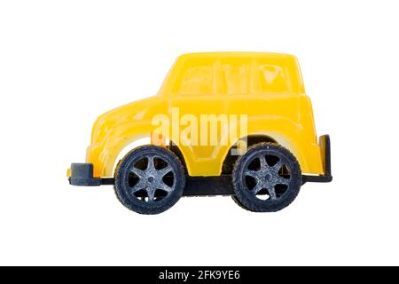 Yellow toy car, toy car for kids or business finance on buy and sell car, isolated on white background Stock Photo