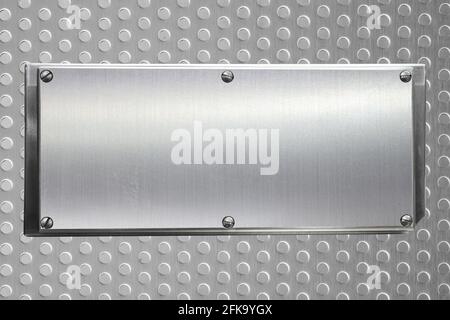Empty stainless steel plate banner on steel plate with a porous circle, copy space for put text character or commercial and message promotion Stock Photo