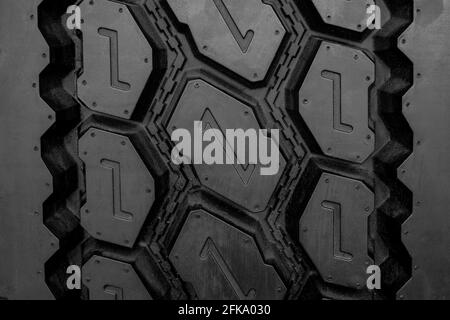 Close-up industrial tire of tractor car with detail and pattern background Stock Photo
