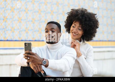 black and handsome couple taking a selfie Stock Photo