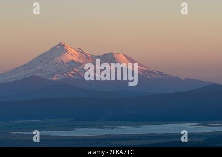 Mount Shasta at sunset as seen from Hamaker Mountain in Klamath County, Oregon. Stock Photo