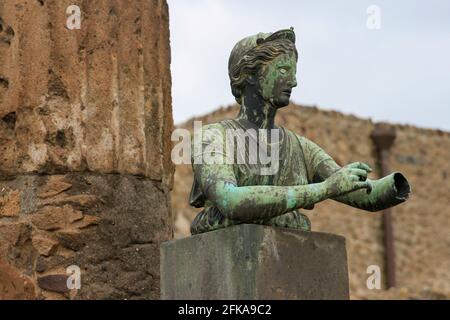 Damaged bronze bust of Artemis at Temple of Apollo in Pompeii, Italy Stock Photo