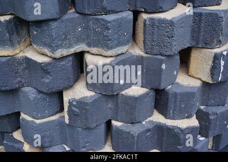 A stack of bricks in gray. Stock Photo